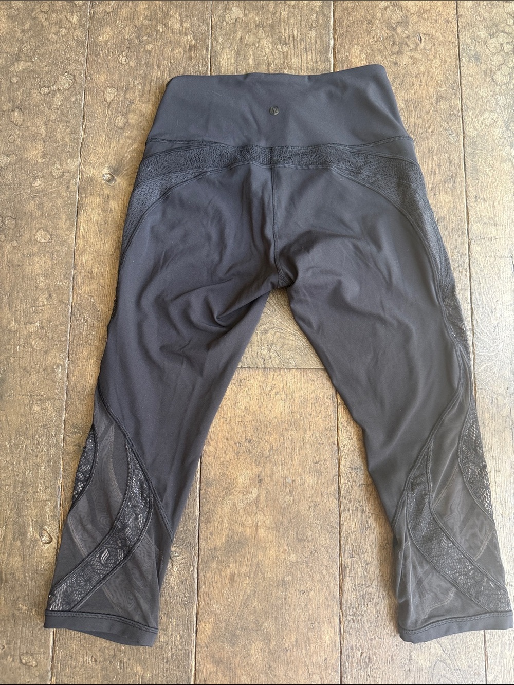 Lululemon Black Cropped Athletic Leggings with Mesh Panel Detail